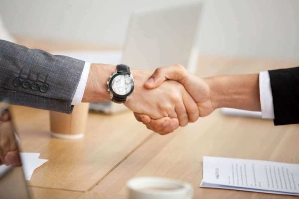 closeup-view-handshake-two-businessmen-suits-shaking-hands.jpg